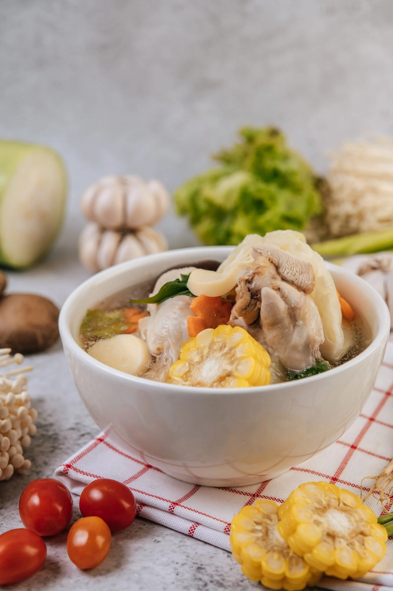 chicken-soup-with-corn-shiitake-mushroom-enoki-mushroom-carrot_1150-25850